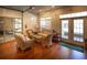 Bright and inviting community lounge area with cozy seating, natural light, and elegant decor at 1025 Riverland Woods Pl # 907, Charleston, SC 29412
