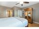 Main bedroom featuring an ensuite bathroom and a mirrored wardrobe at 1025 Riverland Woods Pl # 907, Charleston, SC 29412