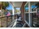Charming porch with chairs offering an inviting space to relax outdoors at 1025 Riverland Woods Pl # 907, Charleston, SC 29412