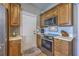 Well-equipped kitchen features stainless steel appliances and ample counter space at 103 Sago Palm Ct, Summerville, SC 29483