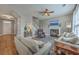 Inviting living area with fireplace, ceiling fan, and a staircase visible at 103 Sago Palm Ct, Summerville, SC 29483