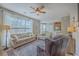 Spacious living area featuring comfortable sofas and an open floor plan at 103 Sago Palm Ct, Summerville, SC 29483