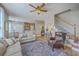 Open concept living area with wood floors and staircase to the second floor at 103 Sago Palm Ct, Summerville, SC 29483