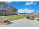 Spacious backyard featuring patio furniture, lawn, and a view of the neighborhood at 107 Willett Ln, Summerville, SC 29486