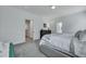 Bedroom featuring neutral decor and an open doorway to ensuite bath and closet at 107 Willett Ln, Summerville, SC 29486