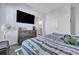 Comfortable bedroom with a full bed, a large screen TV, and a neutral color scheme at 107 Willett Ln, Summerville, SC 29486