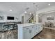 Open-concept kitchen featuring a large island with pendant lighting and a view into the dining area at 107 Willett Ln, Summerville, SC 29486