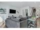 Spacious living room with a comfortable sectional sofa and modern decor at 107 Willett Ln, Summerville, SC 29486