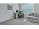 Well-lit office area featuring a modern desk setup, a comfortable swivel chair, and ample natural light at 107 Willett Ln, Summerville, SC 29486