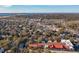 Panoramic aerial view of a charming coastal town with a bridge and harbor in the distance, showcasing a beautiful landscape at 108 Rose Ln, Mount Pleasant, SC 29464