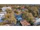 Aerial perspective of a residential area with houses nestled among trees and a mix of architectural styles at 108 Rose Ln, Mount Pleasant, SC 29464
