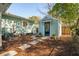 Backyard featuring a small shed with a blue door at 108 Rose Ln, Mount Pleasant, SC 29464