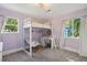 Stylish bedroom with bunk bed, desk, and plenty of natural light at 108 Rose Ln, Mount Pleasant, SC 29464