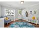 Bright foyer features stylish décor, hardwood floors, and a welcoming ambiance at 108 Rose Ln, Mount Pleasant, SC 29464