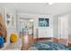 Open foyer with hardwood floors and views into dining and kitchen areas at 108 Rose Ln, Mount Pleasant, SC 29464