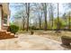 Large backyard with mature trees, patio, and outdoor recreation features at 109 Buckingham Ave, Summerville, SC 29485