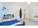 A well-decorated bedroom with light blue walls, nautical decor, and a surfboard at 109 Buckingham Ave, Summerville, SC 29485