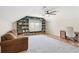 Bonus room including a couch, desk, and shelves filled with books at 109 Buckingham Ave, Summerville, SC 29485