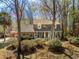 Exterior shot of home with a sprawling lawn, mature trees and landscaping, adding to curb appeal at 109 Buckingham Ave, Summerville, SC 29485