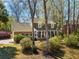 Well maintained two-story brick facade with an inviting front porch with seating at 109 Buckingham Ave, Summerville, SC 29485