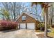 Detached two-car garage with brick exterior and lush landscaping, offering curb appeal at 109 Buckingham Ave, Summerville, SC 29485