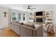 Cozy living room with a brick fireplace, built-in shelves, and comfortable seating arrangement at 109 Buckingham Ave, Summerville, SC 29485