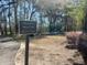 Community amenities include walking path and playground with play structures and natural landscaping at 109 Buckingham Ave, Summerville, SC 29485