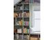 Book shelves filled with books, baskets, and decor at 109 Buckingham Ave, Summerville, SC 29485