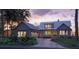 Charming craftsman home with metal roof, covered porch at dusk at 111 Peninsula Dr, Ravenel, SC 29470