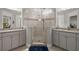 Spacious bathroom with double vanities and a modern glass-enclosed shower at 1174 Old Field Dr, Summerville, SC 29483