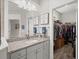 Granite-topped vanity in a well-lit bathroom with a walk-in closet visible at 1174 Old Field Dr, Summerville, SC 29483