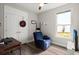 Cozy bedroom with natural light, a chair, and a modern ceiling fan at 1174 Old Field Dr, Summerville, SC 29483