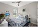 Charming bedroom featuring a window, floral bedding, and decorative accents at 1174 Old Field Dr, Summerville, SC 29483