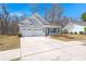 Well-maintained single-Gathering home with a two-car garage and covered front porch, set in a serene neighborhood at 1174 Old Field Dr, Summerville, SC 29483