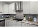 This kitchen features granite countertops, stainless steel appliances and stylish cabinetry at 1174 Old Field Dr, Summerville, SC 29483