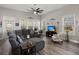 Living room with natural light, a ceiling fan, and access to an outdoor area at 1174 Old Field Dr, Summerville, SC 29483