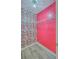 Unique walk-in closet featuring a pink accent wall, vibrant skull wallpaper, and a wire shelving unit at 118 Lamplighter Ln, Summerville, SC 29486