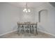 Cozy dining area with a modern table set and chandelier lighting at 118 Lamplighter Ln, Summerville, SC 29486