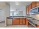 Modern kitchen with stainless steel appliances and an open layout to the living area at 118 Lamplighter Ln, Summerville, SC 29486