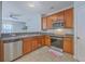 Well-equipped kitchen featuring stainless steel appliances and wood cabinetry at 118 Lamplighter Ln, Summerville, SC 29486