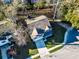 Overhead view of a cozy house showcasing the surrounding neighborhood and a nearby street at 1309 Belgian Draft Dr, Mount Pleasant, SC 29466