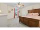Bedroom with light yellow walls, carpeted floor, and wood frame bed with matching bedside table at 1309 Belgian Draft Dr, Mount Pleasant, SC 29466