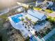 Aerial view of a community pool with palm trees, pergola, and plenty of space for lounging at 1309 Belgian Draft Dr, Mount Pleasant, SC 29466