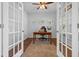 Bright home office with natural light, hardwood floors, and ample workspace for productivity at 1309 Belgian Draft Dr, Mount Pleasant, SC 29466