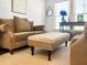 Comfortable living room with neutral tones, large windows, and plush furniture, creating an inviting atmosphere at 1309 Belgian Draft Dr, Mount Pleasant, SC 29466