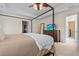 Comfortable bedroom featuring neutral tones, a ceiling fan, and access to the ensuite bathroom at 1309 Belgian Draft Dr, Mount Pleasant, SC 29466