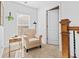 Cozy reading nook featuring comfortable armchair, side table and natural light at 1309 Belgian Draft Dr, Mount Pleasant, SC 29466