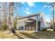 View of back of house with screened in porch at 1309 Belgian Draft Dr, Mount Pleasant, SC 29466
