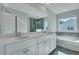 Bathroom featuring a double vanity, soaking tub, and a tiled shower with modern fixtures at 131 Swaying Palm Dr, Summerville, SC 29485