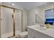 Bright bathroom with a standing shower and a vanity with sink at 131 Swaying Palm Dr, Summerville, SC 29485